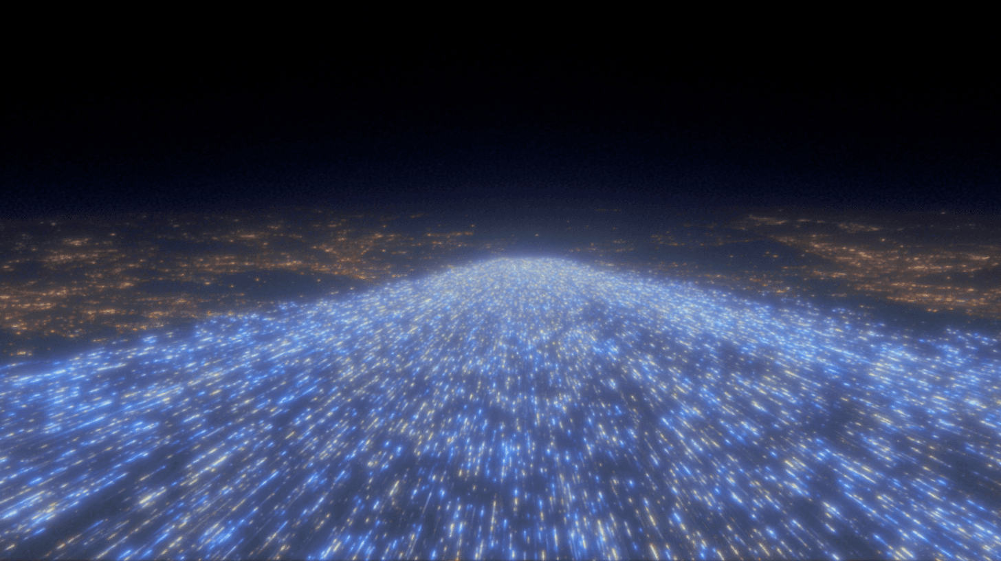 Streams of blue light racing across a dark landscape at night.